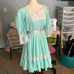 24 in waist blue dress with belt loops.